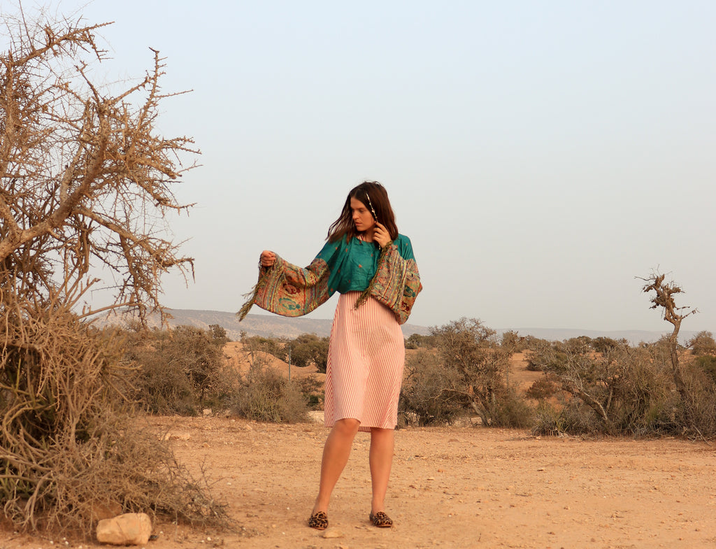 woman in a dessert climate wearing pashmina top